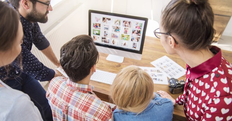 picture of a family looking at website design for web design agency in hamilton